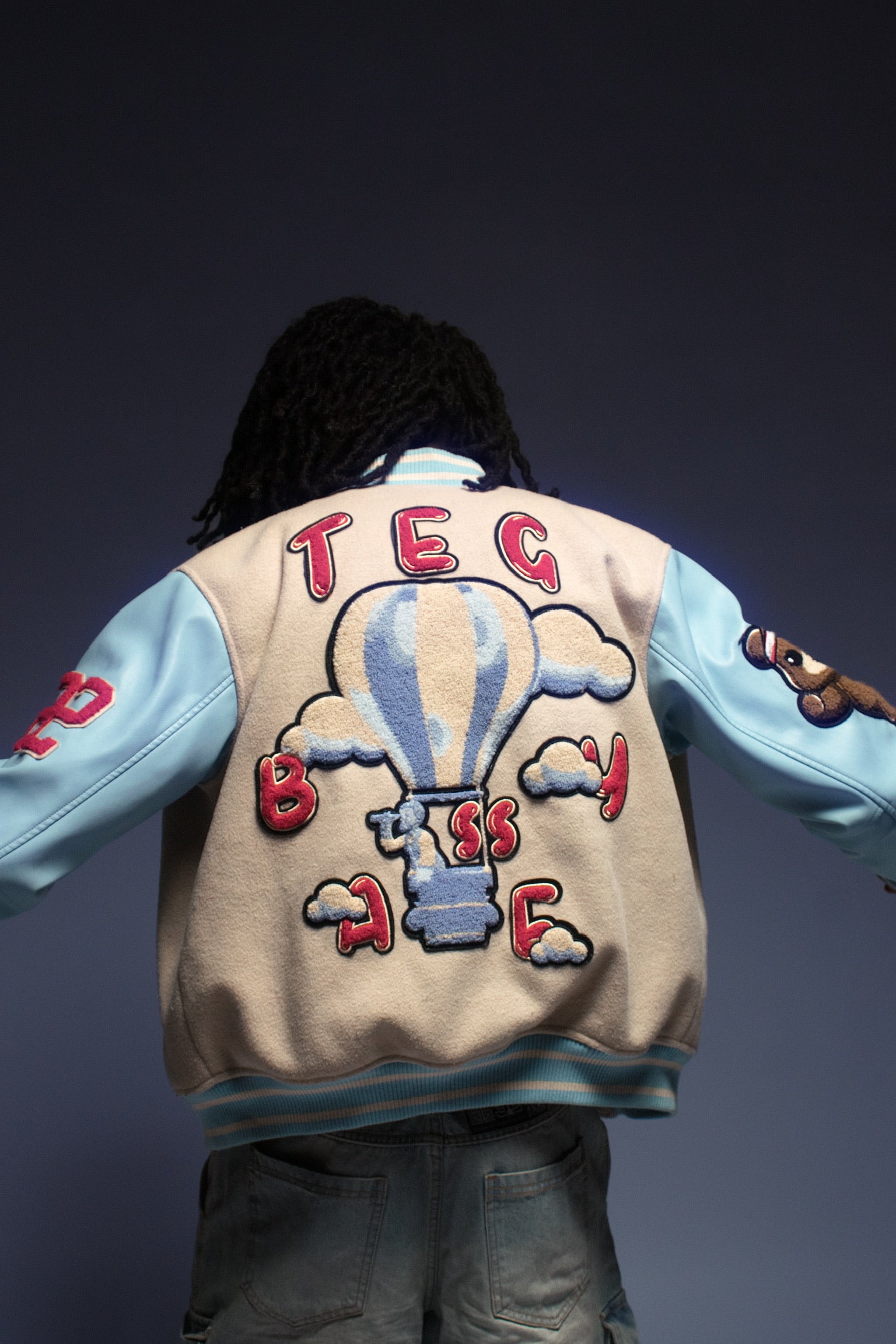 skies the limit varsity jacket.